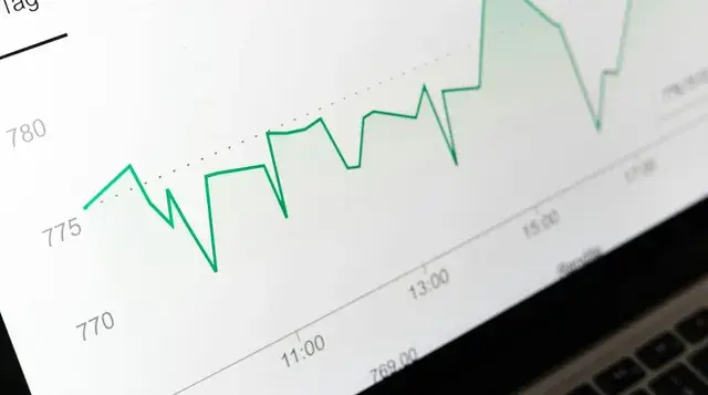 Rising line chart on a laptop